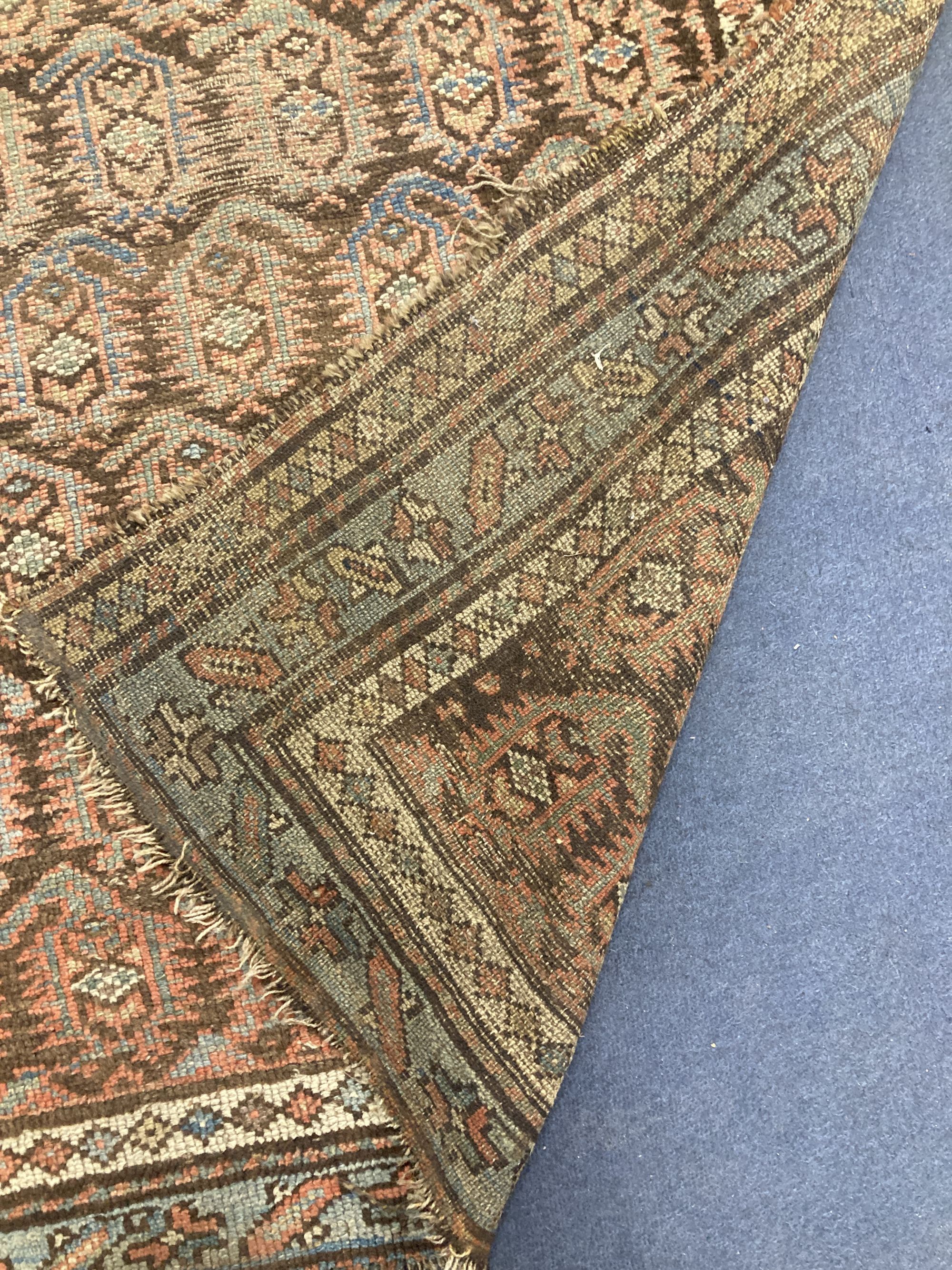 A Caucasian Boteh rug, 255 x 122cm